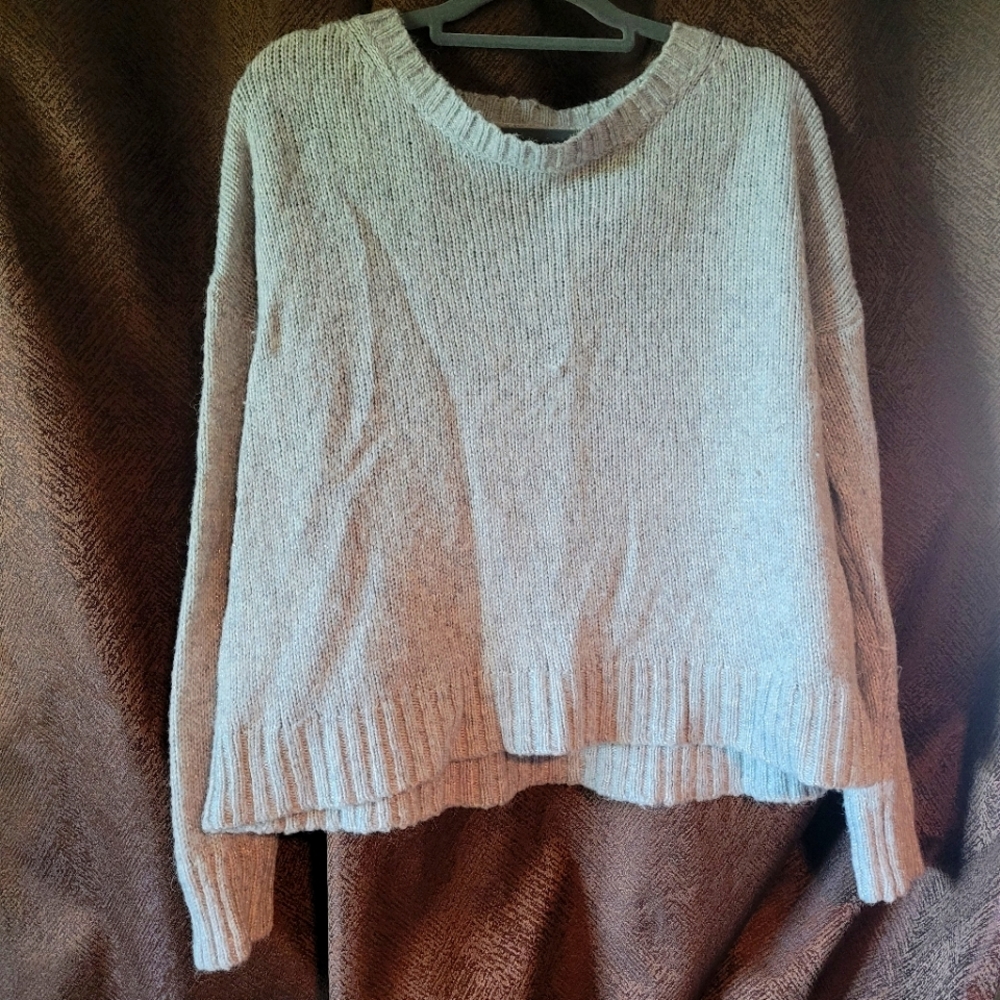 American Eagle Knit sweater with sparkles.
